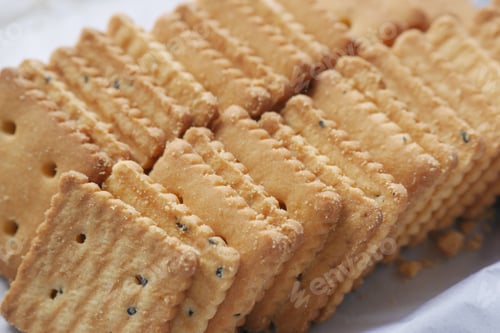 Preview: close up of sweet cookies on wooden table