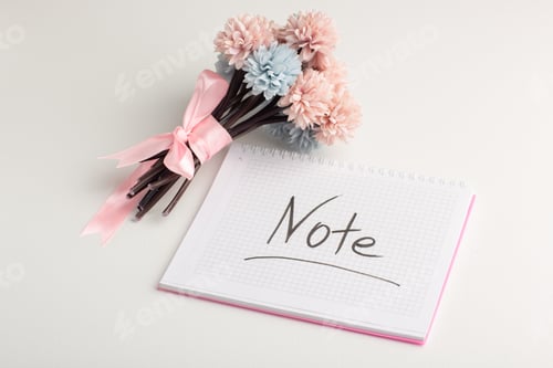 Preview: front view open copybook with flowers on the white background school notepad pen plant study