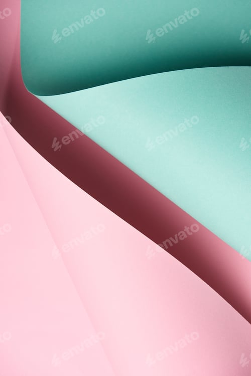 Preview: close-up view of abstract creative turquoise and pink colored paper background