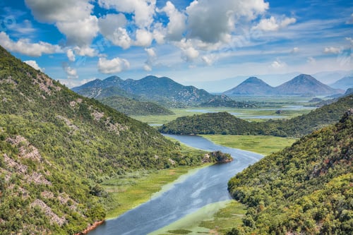 Preview: Captivating view of the Crnojevic river bend around green mountain peaks on a sunny day.