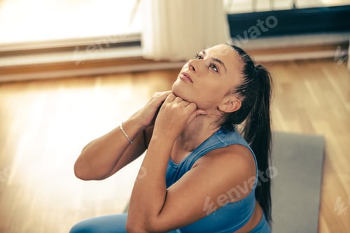 Preview: Woman Doing Stretching Exercises At Home