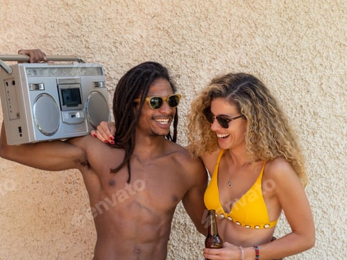 Preview: Caucasian blonde girl and black boy with dreadlocks, dance with an antique stereo