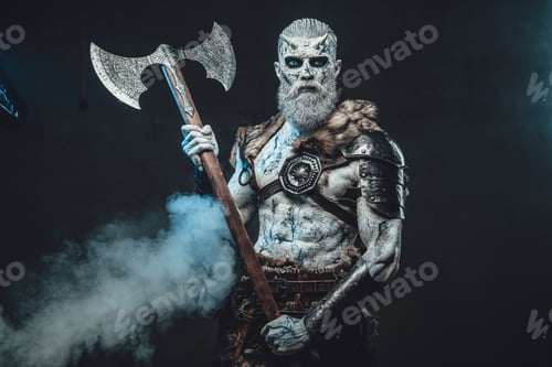 Preview: Savage dead warrior with huge axe in smokey dark background