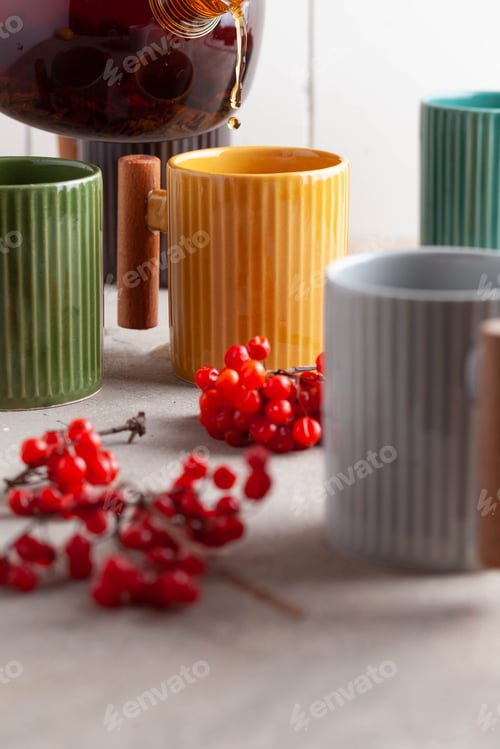 Preview: colorful mugs of tea