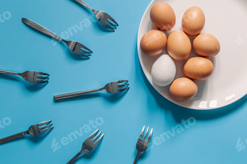 Preview: Eggs on a Plate Surrounded by Forks