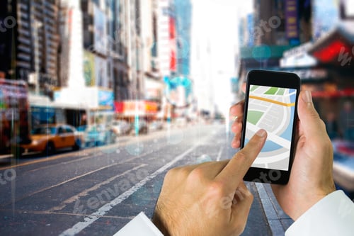 Preview: Man Using Map App On Phone Against Blurry New York Street