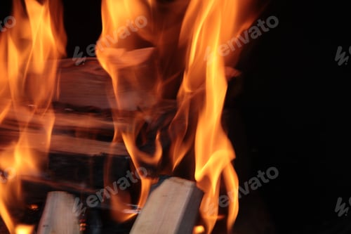 Preview: Bright orange flames against a dark background