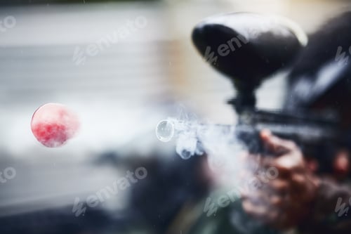 Preview: Closeup, person and paintball gun shooting with ball for fun, extreme and sport, fitness and traini