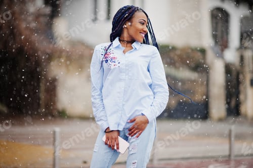 Preview: Stylish african american girl with dreads