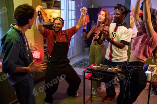 Preview: Group of Diverse young People Celebrating and Dancing at House Party