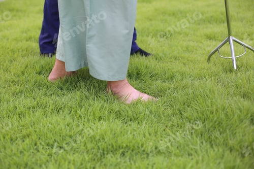 Preview: Healthcare doctor or caregiver visiting senior man indoors at homecare.