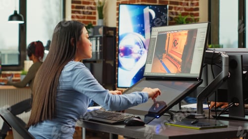 Preview: Asian game developer working in production department
