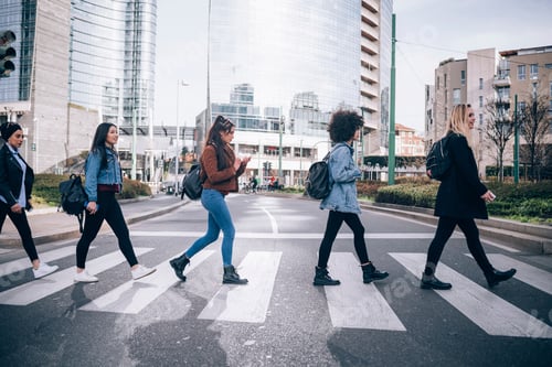 Preview: Friends crossing road on zebra crossing
