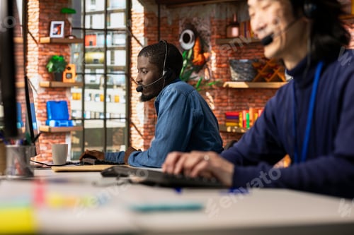 Preview: Call center agent at office desk helping customers regain access to accounts