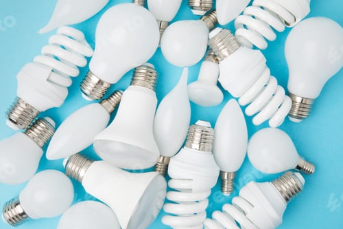 Preview: top view of different white lamps isolated on blue