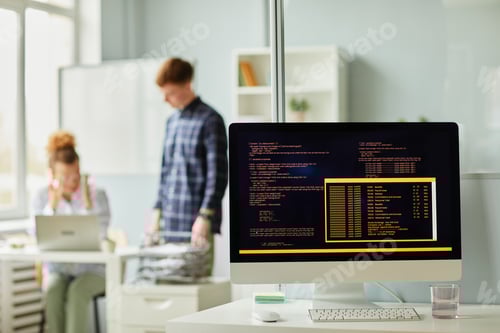 Preview: Computer codes on monitor at office