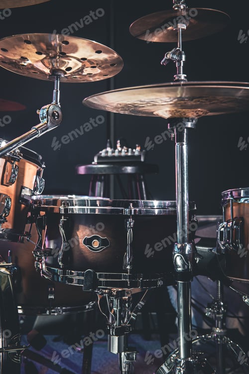 Preview: Close-up, part of a drum kit on a blurred background.