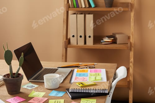 Preview: paper stickers with business strategy, cactus and laptop on tabletop
