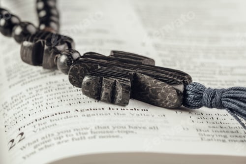 Preview: Bible and a crucifix on an old wooden table. Religion concept