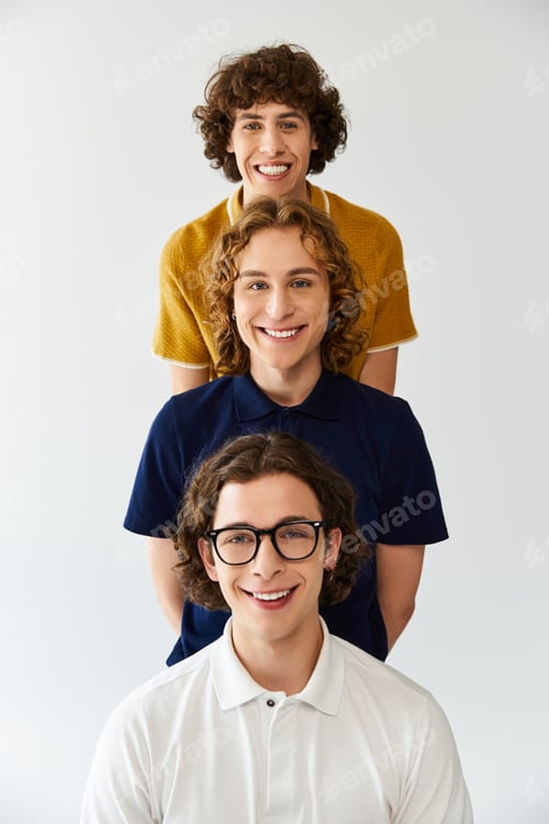 Preview: Young stylish friends enjoying a joyful moment together in a modern indoor setting