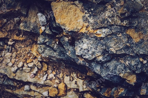 Preview: Grunge texture of wild stones in nature