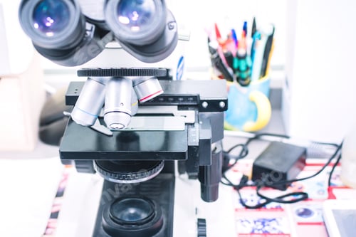 Preview: Close-up of a microscope with different optics.