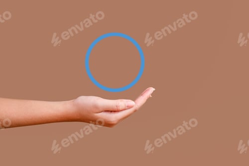 Preview: Outstretched Woman Hand Under A Floating Blue Circle Symbol Diabetes On Brown Background.