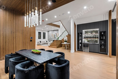 Preview: Modern dining and living area in a luxurious home interior.