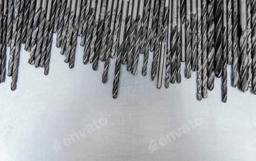 Preview: Drills on the scratched metal background.