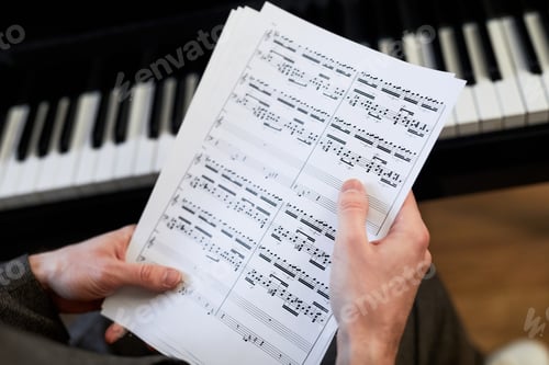 Preview: Musician reading the sheet music