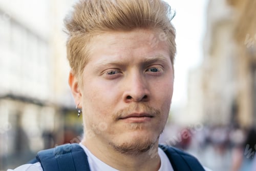 Preview: Close-up of albino latino man in the city street.