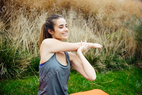 Preview: Young woman to practice stretching after yoga