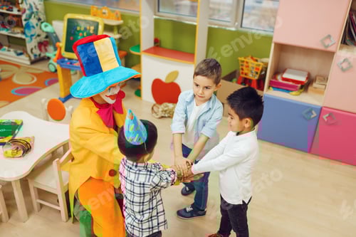 Preview: Boys with Clown Putting Hands Together for Celebration