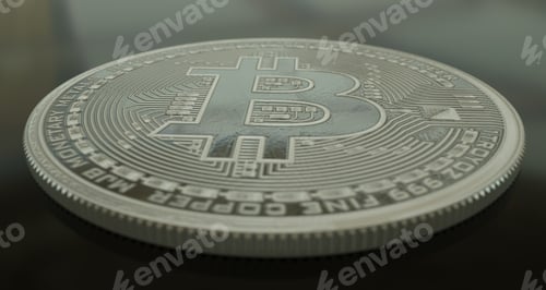 Preview: Closeup shot of a bitcoin on a dark background