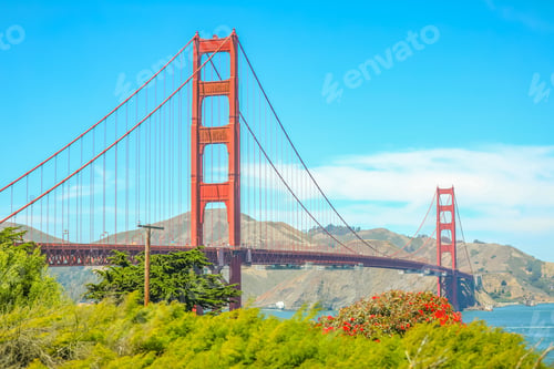 Preview: Golden Gate Bridge in San Francisco, CA, USA on a sunny day with blue sky and clouds.
