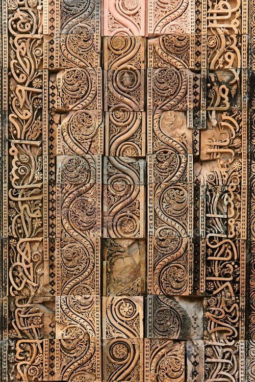 Preview: Wall decorative patterns of Qutb complex in South Delhi, India, close up ancient bas relief