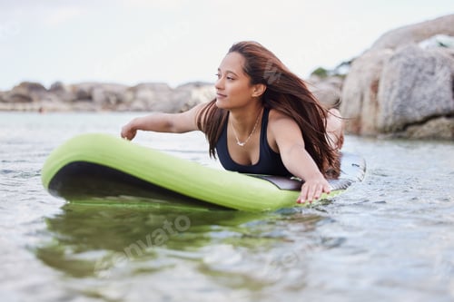 Preview: Fitness, surfer woman surfing in ocean with surfboard, swimwear and peace with sport outdoor and na