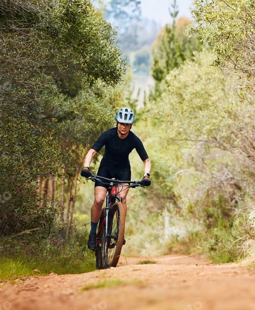 Preview: Action, fitness and cycling with woman on dirt path in nature for workout, training and competition