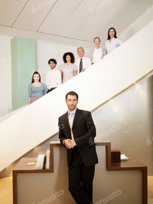Preview: Portrait of office workers on stairs