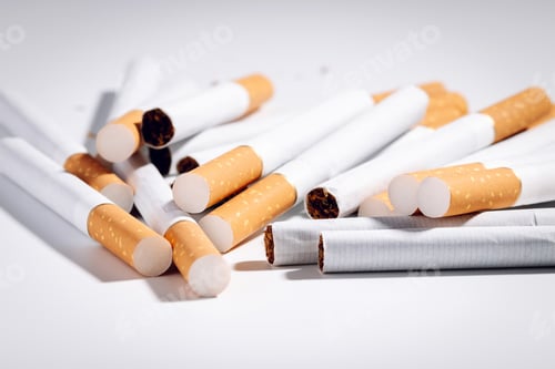 Preview: Pile of cigarettes on a white background. No smoking concept