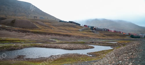 Preview: Trains traverse the stunning landscape of Svalbard during overcast weather