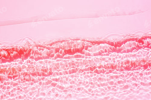 Preview: Cosmetic background, texture of transparent pink water with seething ripples , waves