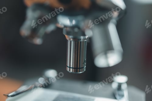Preview: Scientific microscope data analysis in the metal lens at laboratory. research medicine concept.