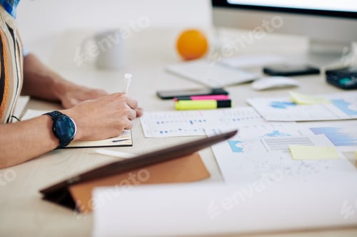 Preview: Man writing business plan