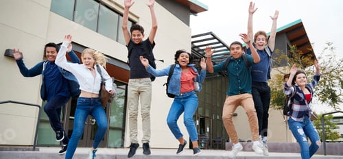 Preview: Group Of High School Students Jumping In Air Outside College Buildings