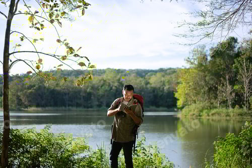 Preview: Man go to travel at natural park.