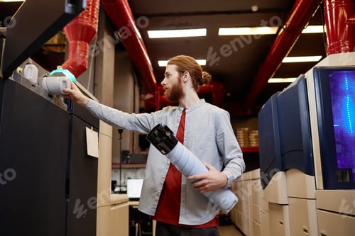 Preview: Male Worker in Printshop