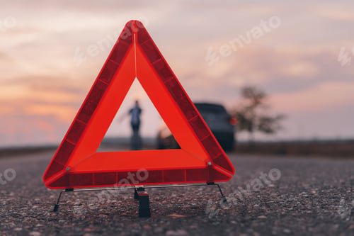 Preview: Warning triangle sign on the road