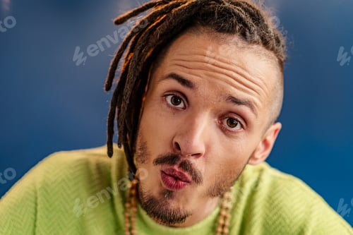 Preview: Portrait of a happy positive guy with dreadlocks