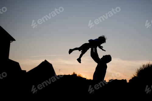 Preview: father and son, silhouette portrait of two people.